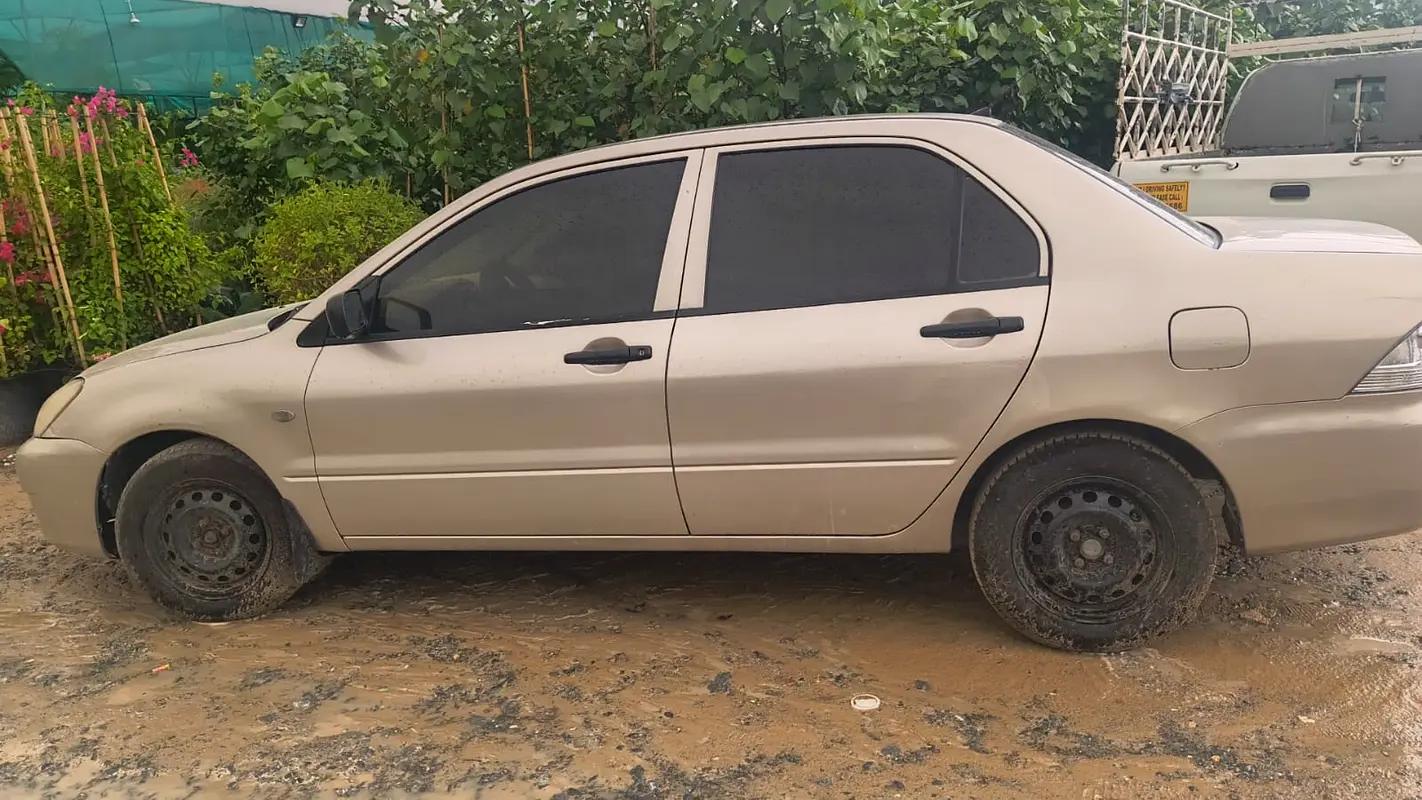 Mitsubishi Lancer EX 2009 — photo 1 of 5