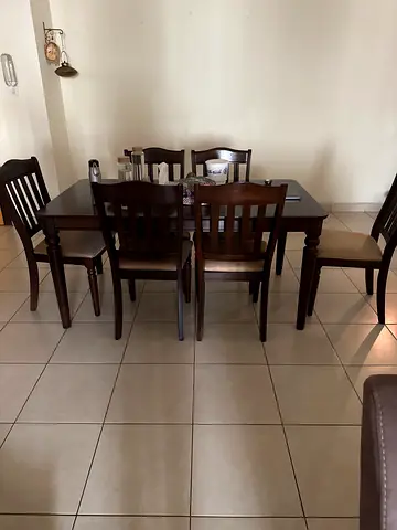 My solid wood dining table set with 6 chairs