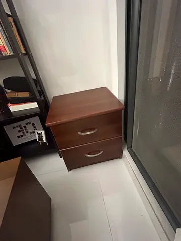 Two brown bedside tables. Not identical