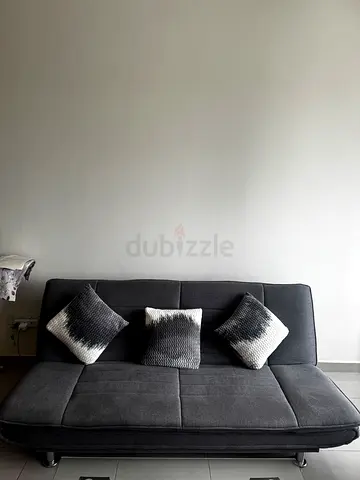 Move Out Sale-Grey 3-seater fabric sofa cum bed with 3 cushions