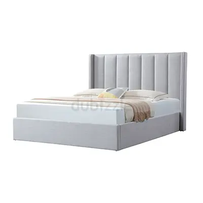 Light grey upholstered bed frame with channel headboard