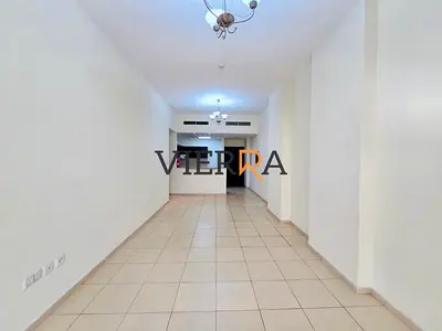 شقة واسعة بغرفة نوم واحدة | غير مفروشة | موقع مميز