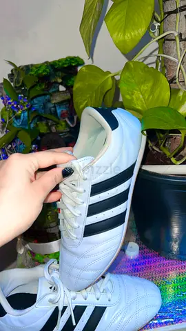 White soccer shoes with black stripes - lightly used price 120