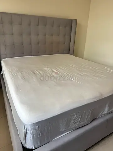 Queen size upholstered bed with Gray bed-frame  for sale
