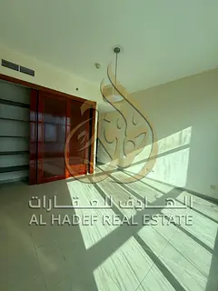 Two-bedroom apartment in Al Taawun area. Free air conditioning, free gym, built-in wardrobes, balcon