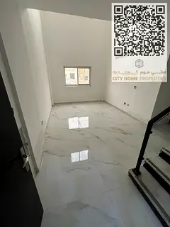 3-bedroom duplex apartment with a living room, first occupancy, for annual rent in Ajman - Al Muwaih