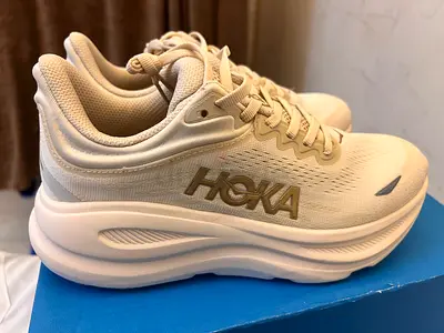 My HOKA cream running shoes — gently used