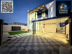 Luxury villa with a modern design, 5000 sq ft, with a garden, behind Ajman Academy. Price includes a