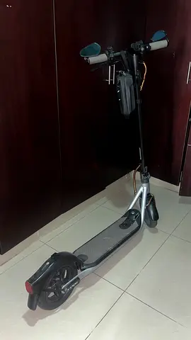 6 months used electric scooter with mirrors and power bank— good condition. Modified. Has locks.