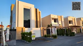 Villa for sale in Ajman, Al Zahia area. 5 master bedrooms, living room, majlis, roof terrace, maid&#