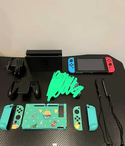 WhatsApp 0568281140.  Nintendo Switch console with dock, Joy-Cons  extra themed shells (used)