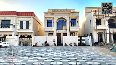 Villa for sale in Ajman, Al Zahia area. 5 master bedrooms, living room, majlis, roof terrace, maid's room. Includes fees, electricity, and air conditi