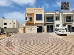 Villa for sale in Ajman, Al Zahiyah area. 5 master bedrooms, majlis, living room, and maid's roo