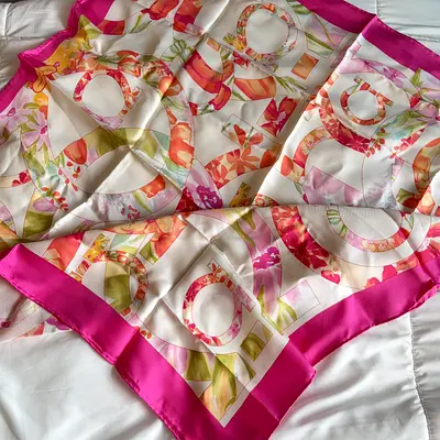 Authentic Ferragamo silk scarf  with floral pattern never used ( still with its original label )