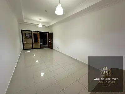 Luxury 1BR apt | Master bed | Spacious hall | 2 baths | Open balcony | Kitchen w/ appliances | Gym, pool & aqua park | Free month
