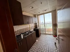 A one-bedroom apartment for annual rent in a prime location directly on Sheikh Khalifa Street, close