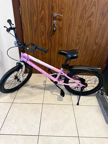 My daughter’s pink kids bike - gently used