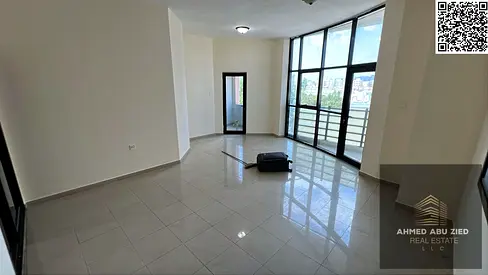 Two-bedroom apartment with a living room and a master bedroom for rent in a prime location on Al Ittihad Street, next to Emirates Markets, close to al