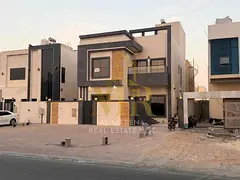 A villa for sale in Al Muwaihat, Ajman, with all utilities (electricity, water, and air conditioning