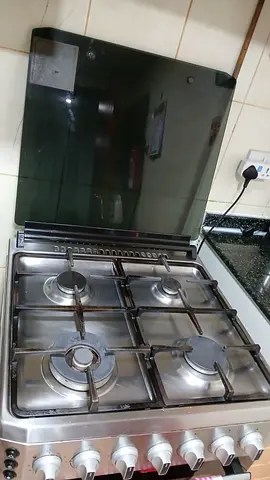 My 4-Burner Stainless Steel Gas Cooker with Oven - Good Working Condition