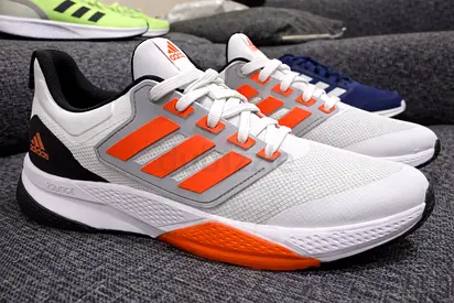 Adidas men’s running shoes - white with orange accents, never used