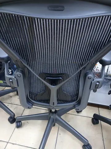 Herman Miller  brand chair like new condition  perfect working  with back support more details conta