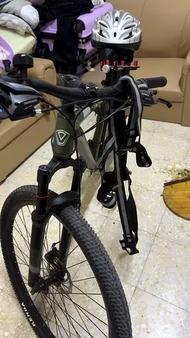 Mountain Bike with Helmet and Lock - Good Condition