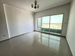 Free parking, two bedrooms and a living room with a large balcony for annual rent in Sharjah, Al Taa