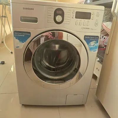 Samsung front-load washing machine (silver) - working condition