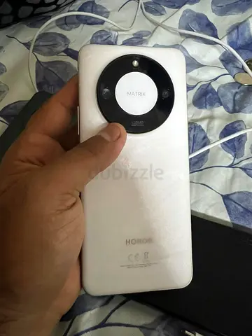 White Honor smartphone (working) — good condition