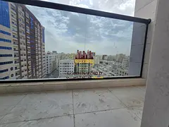 English: 2BR Apartment with 2 Balconies + Free Parking &amp; 1 Month Free in New Tower – AED 53K
