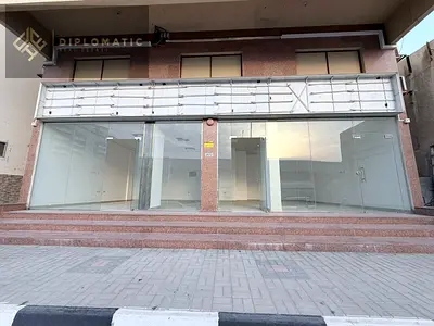 محلان متجاوران سعر كل منهما 30 ألف درهم | النخيل