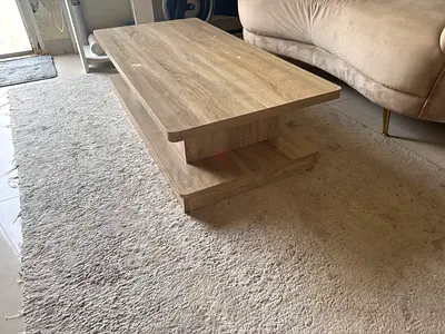 Light oak coffee table with lower shelf - good condition