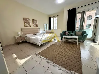 Spacious Studio with Balcony | England Cluster | International City | Ready to Move