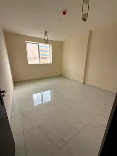 Two-bedroom apartment with a living room for annual rent in Al Jurf 3, Ajman. New building, spacious