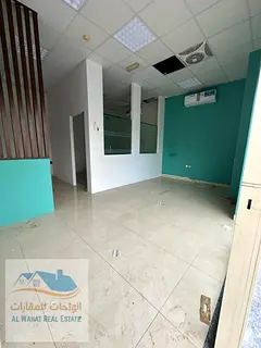 Shop for annual rent in Ajman Al Jurf 3, price 27,000 in 4 installments - excellent location and rea