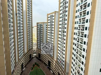 Two bedrooms and a living room for sale in Pearl Towers, Rashidiya 1. Price 450 cash including parking. Large area.