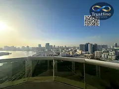 Two bedrooms and a living room for rent in Al Orient Towers, furnished, with city and creek views.