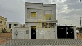 Modern villa for sale in Ajman, Al Yasmin area, with electricity and water connections, at a special