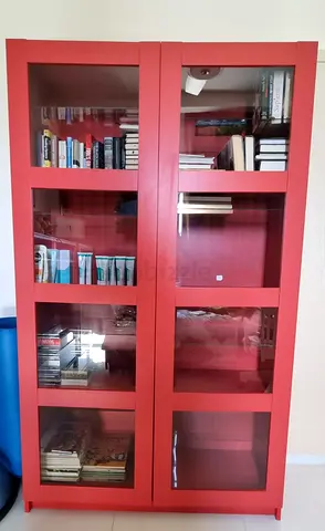Red glass-door bookcase / display cabinet - good condition