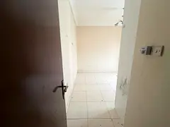 One bedroom and living room for rent in al Nahda, spacious area, free maintenance