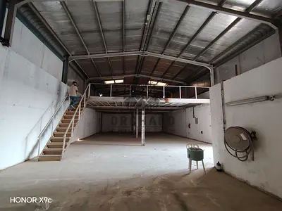 4500 Sqft warehouse with mezzanine / Suitable for garage or storage / ground 3000 / mezzanine 1500 / electricity power 20/ Rent 170,000 Dh