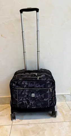 Camo rolling carry-on suitcase with telescopic handle