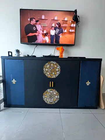 Black  Blue TV/Entertainment Cabinet with Gold Medallions. All is hand painted with good storage