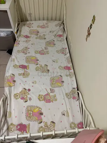 IKEA White metal baby crib with mattress and printed fitted sheet