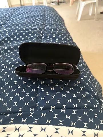 Black eyeglasses with hard zip case