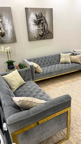 Elegant Grey Velvet Sofas with Gold Accents