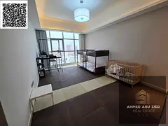 Two bedrooms and a fully furnished living room with three bathrooms, gym, swimming pool, kids' a