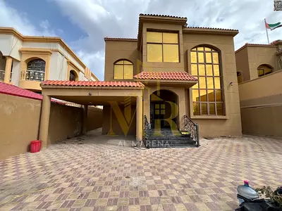 Luxury villa for sale in Al Muwaihat 1, Ajman, near Sheikh Ammar Street. Price includes electricity, water, and air conditioning. Freehold ownership.