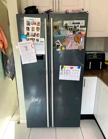 Free delivery Panasonic side-by-side refrigerator/freezer - grey, working well